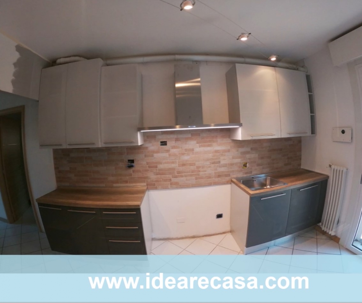 Kitchen with customized boiler cover
